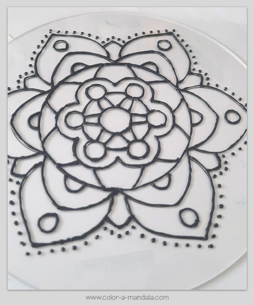 DIY Suncatcher tutorial. Finished tracing the coloring page design.